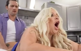 Curvy blonde blows her man in the kitchen and gets shagged